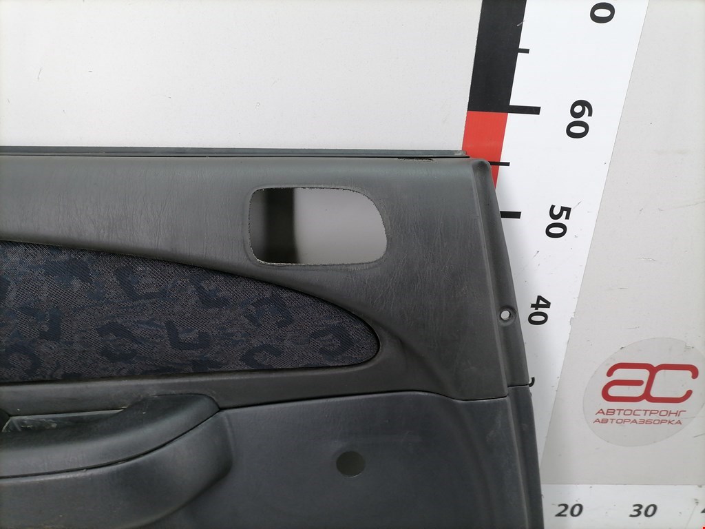Обшивка (карта) двери задней левой Toyota Corolla 8 купить в Беларуси